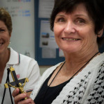Mrs Sandra Hazel, holding St Eugene de Mazenod's Oblate cross